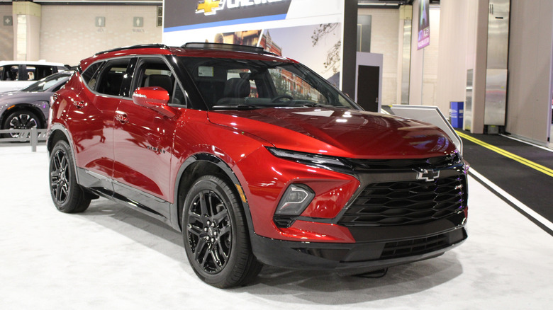 A red 2020 Chevrolet Equinox sub-compact SUV being displayed at an event