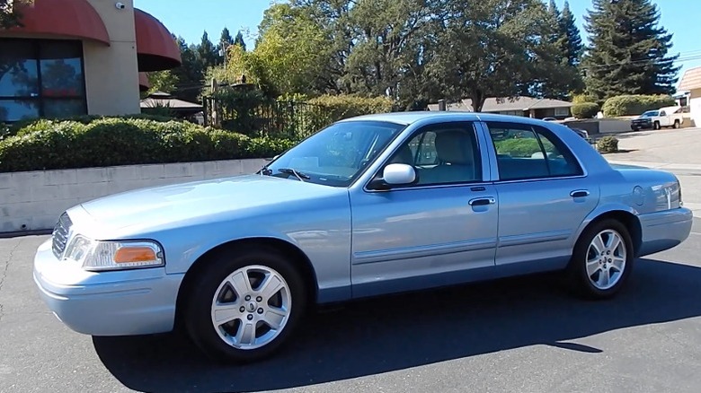 Silver Crown Victoria in a residential area