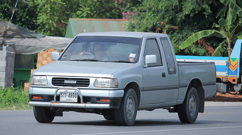 Front 3/4 shot of a 1987 Isuzu Pickup.