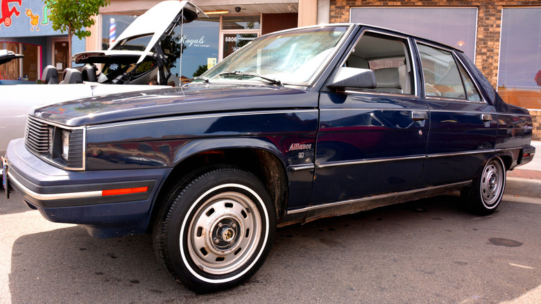 Front 3/4 shot of a blue 1983 Renault Alliance.