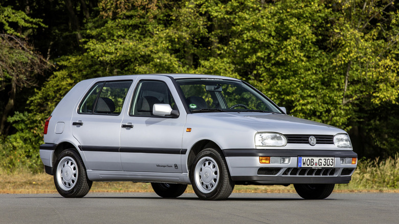 Front 3/4 shot of a silver 1991-1997 Volkswagen Golf.