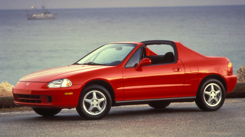 Front 3/4 shot of a red 1996 Honda Del Sol.