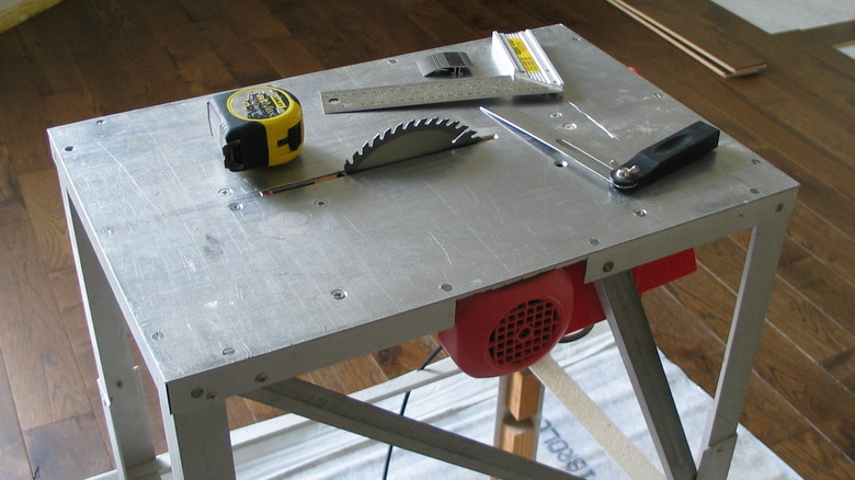 Table Saw with a ruler and tape measure on the surface