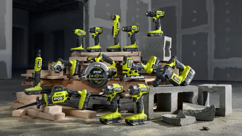 several ryobi tools on cinder blocks and lumber