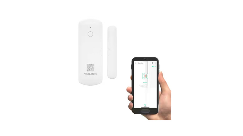 YoLink wireless door and window sensor with the companion app on a white background