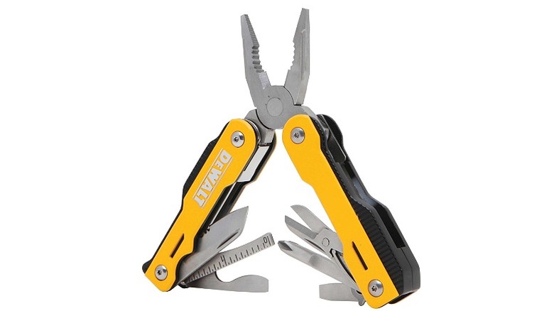 A multitool with different tools against a white background.
