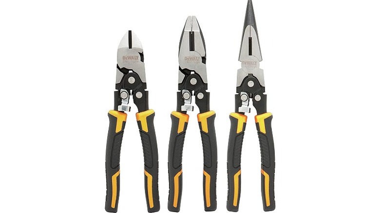 Three pliers of different types against a white background.