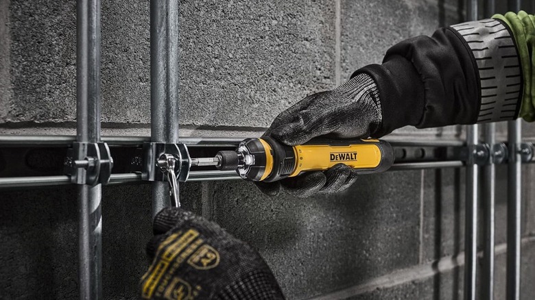 person using DeWalt Cordless Screwdriver