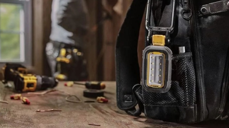 DeWalt LED Task Light hanging on backpack