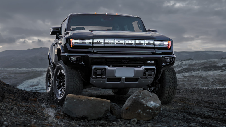 GMC Hummer EV on a rocky trail