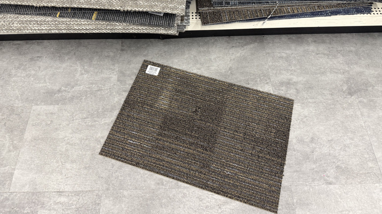 Carpet tile on the floor at Dollar Tree