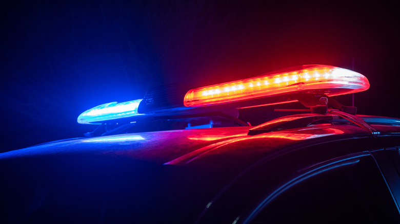 Red and blue lights mounted to the roof of an unidentified vehicle