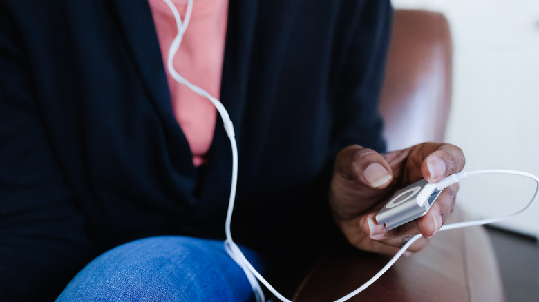 Person holding an iPod Nano