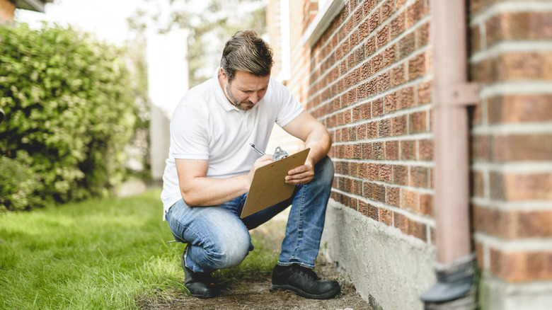 Inspector checking a home