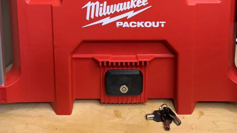 A closeup of bright red Milwaukee Packout XL lock