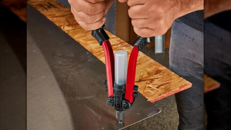 fastening a rivet with Doyle hand riveter