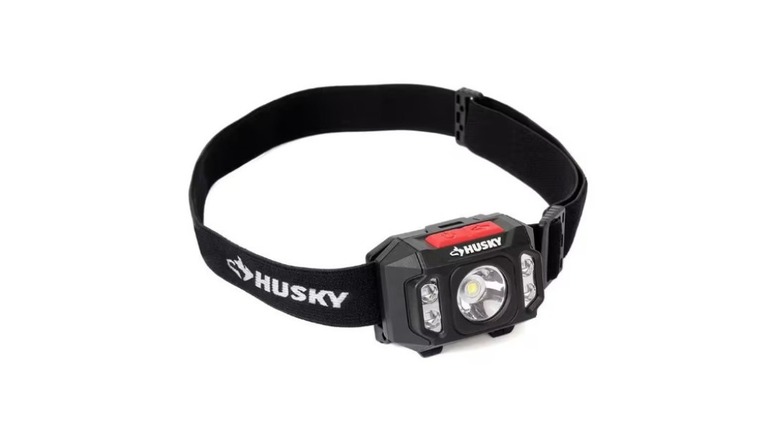 A headlight with a rubber head strap by Husky