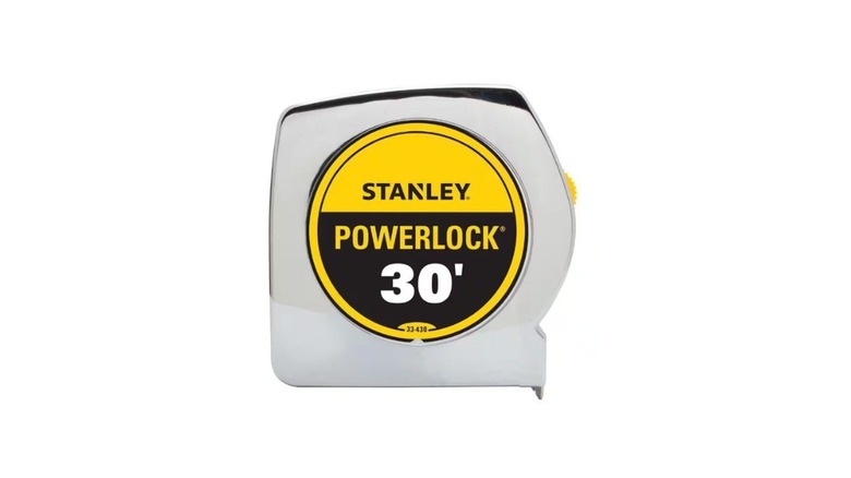 A white Stanley PowerLock 30 feet tape measure