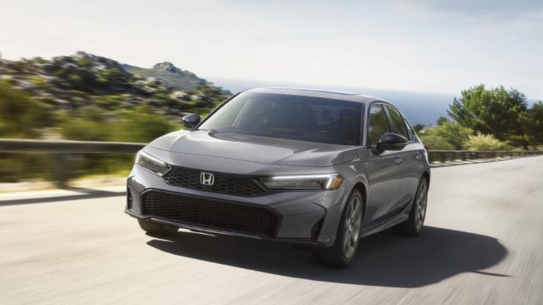 2025 Honda Civic driving down road