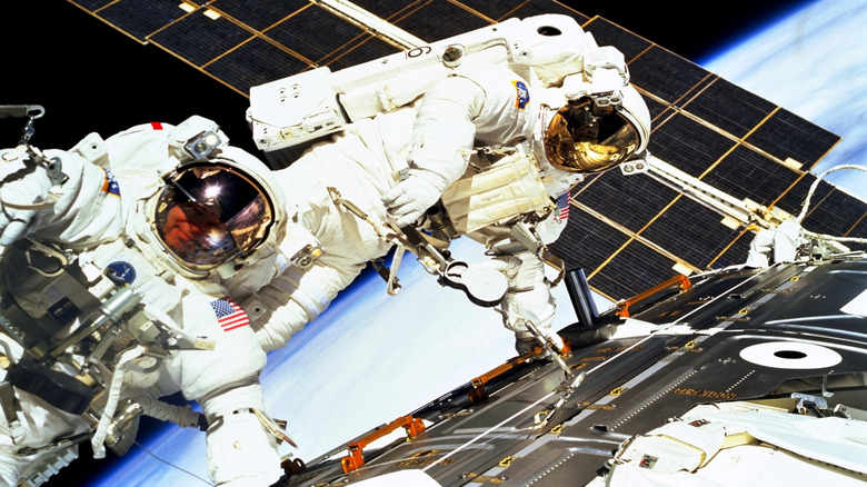 Astronauts spacewalk building the ISS