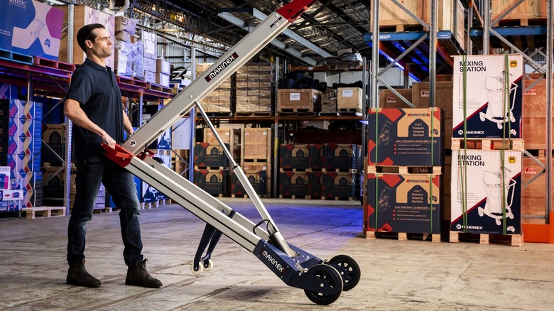 Person using Makinex powered hand truck