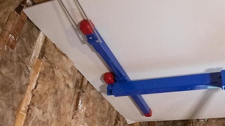 Marshalltown drywall lifter holding drywall panel