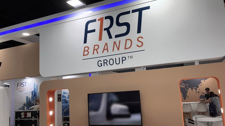 First Brands Group written on a white banner in a store.