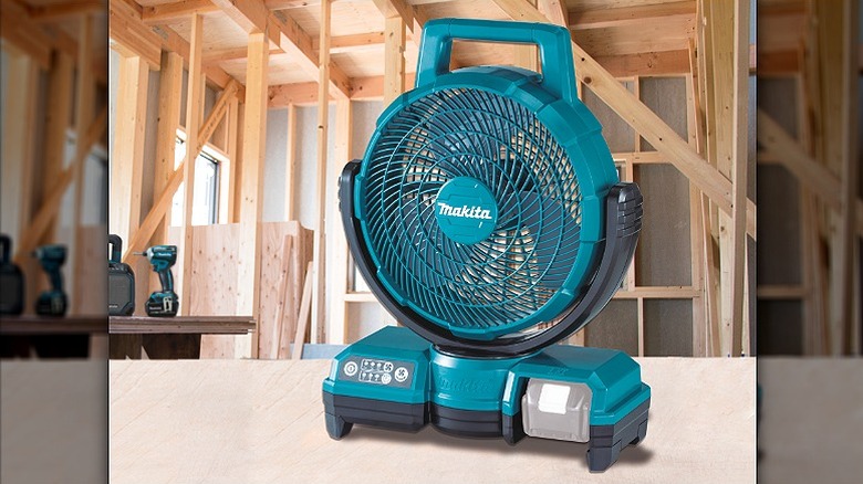 A Makita fan used at a woodworking site.