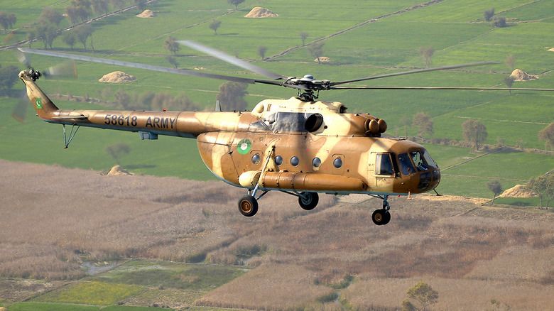 Pakistani Army Mil Mi-17 flying over agricultural terrain