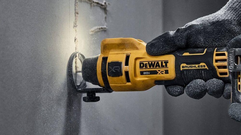 Closeup of DeWalt cut-out tool in use