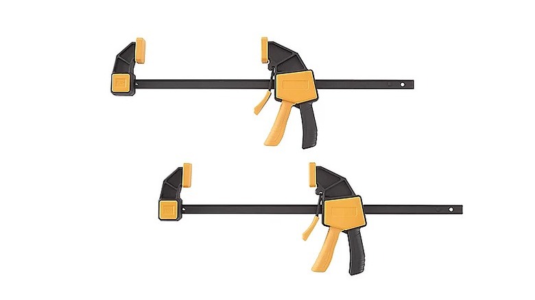Two bar clamps in black and yellow color.
