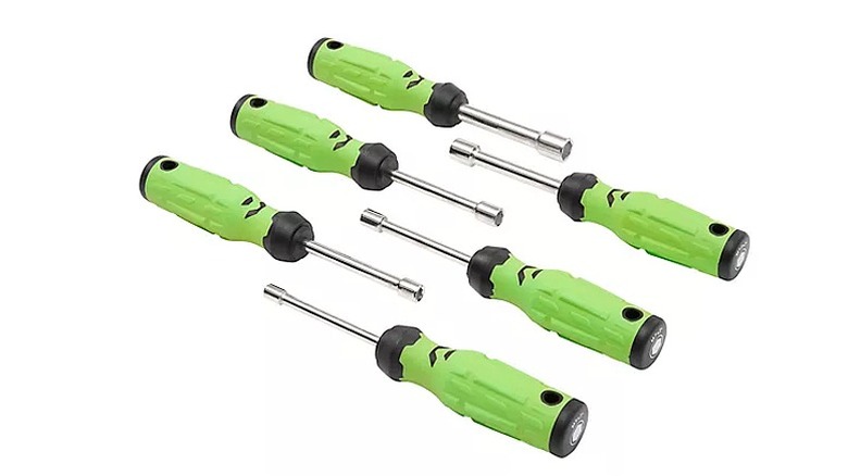 Six nut drivers with lime green handle.