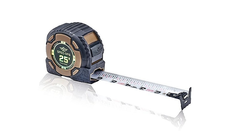 Black Spec Ops tape measure extended to six inches.