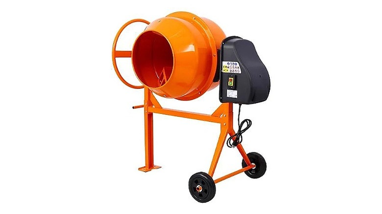 Orange concrete mixture with two black wheels.