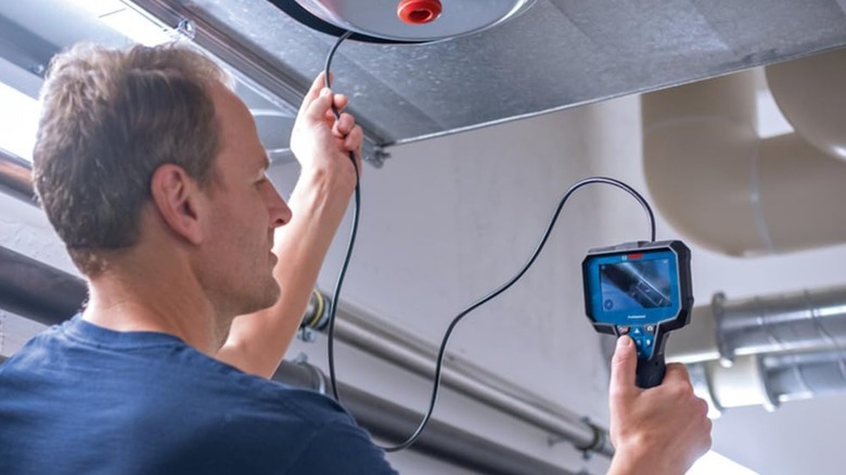 inspecting recessed area with inspection camera