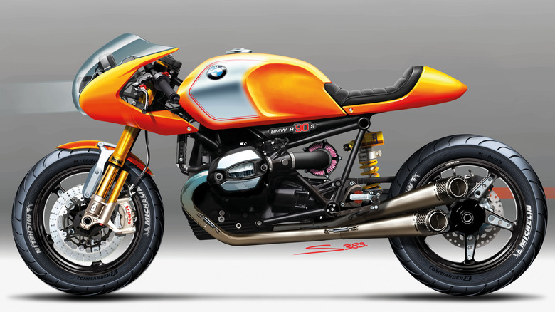 The burnt orange BMW concept ninety on a white floor against a grey background, side view.