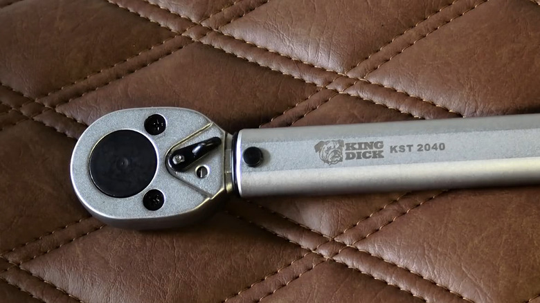 King Dick ratchet on stitched brown leather