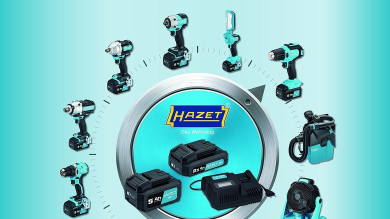 Hazet 18V cordless tool system displayed in a circular layout around central batteries and charger.