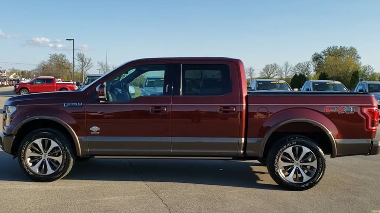 Bronze Fire Metallic F-150 parked