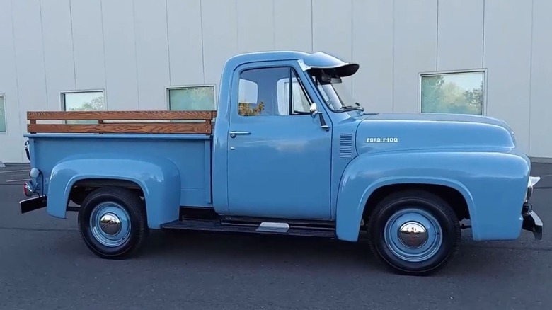 Glacier Blue Ford truck in profile