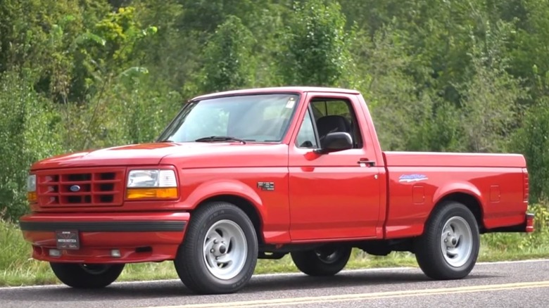 Vermillion Ford F-150 Lightning front 3/4