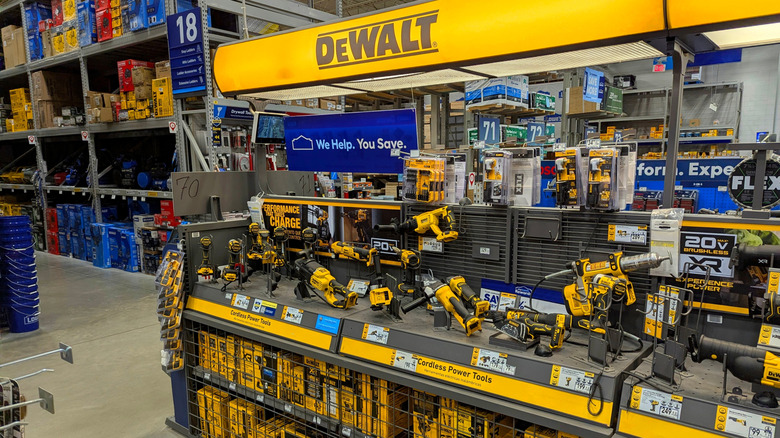A DeWalt tool display in the middle of a hardware store.