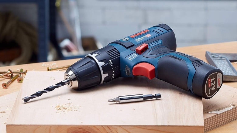 Bosch hammer drill on wood block