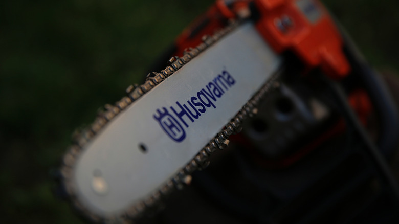 closeup of Husqvarna chainsaw bar