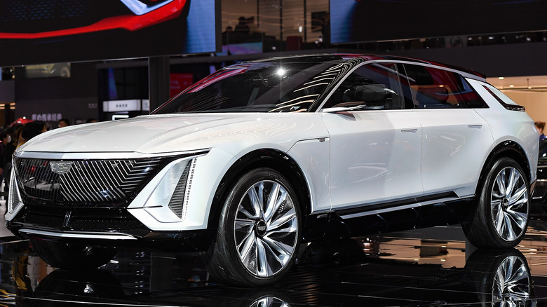 A white Cadillac Lyriq at a showroom