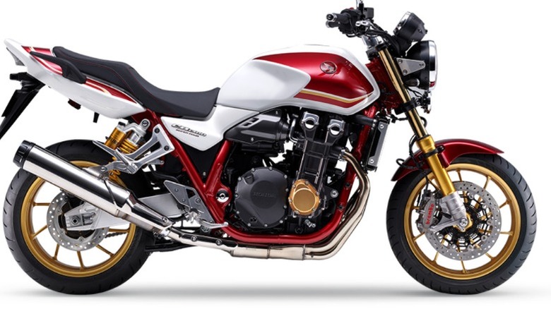 A red Honda CB400 Super Four motorcycle