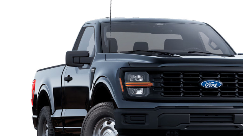 A black Ford F-150 Regular cab variant in the XL trim against a white background, right two quarter views visible