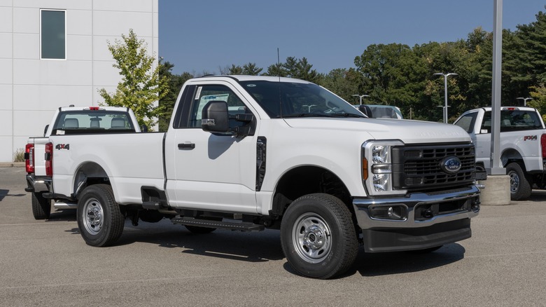 A single cab Ford F-250 for the 2024 model year on display outdoors at a dealer lot