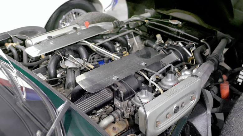 An up close shot of the Jaguar E-Type Series 3 5.3L V12 engine