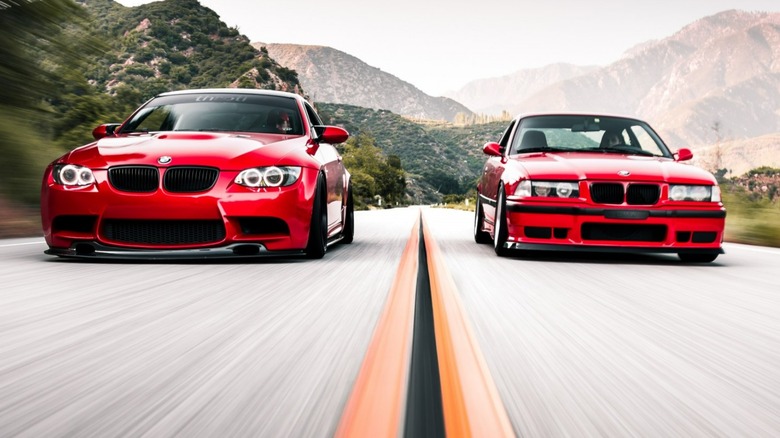 Two red BMW 3 Series
